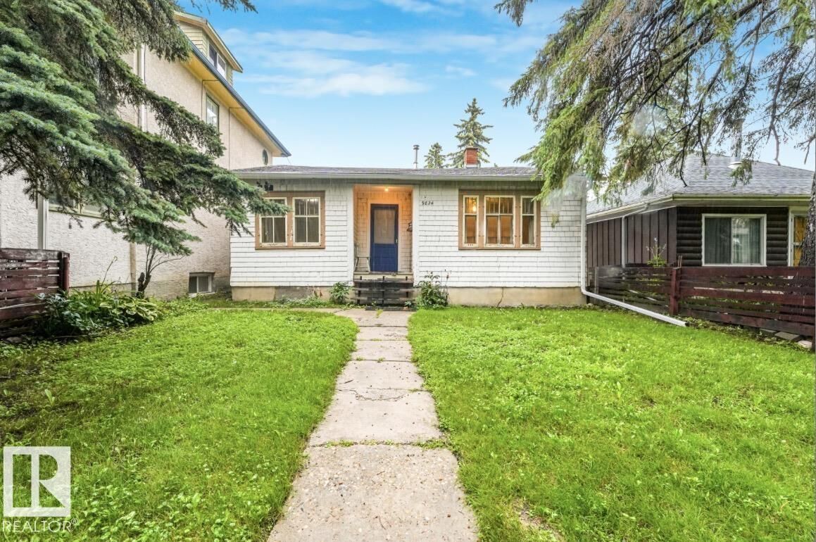 Property Photo:  9824 91 Avenue NW  AB T6E 2T6 