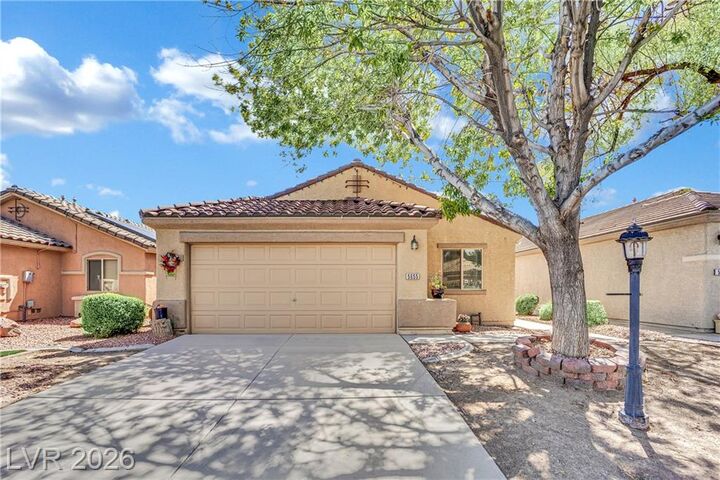 Property Photo: 5655 Crowbush Cove Place NV 89122