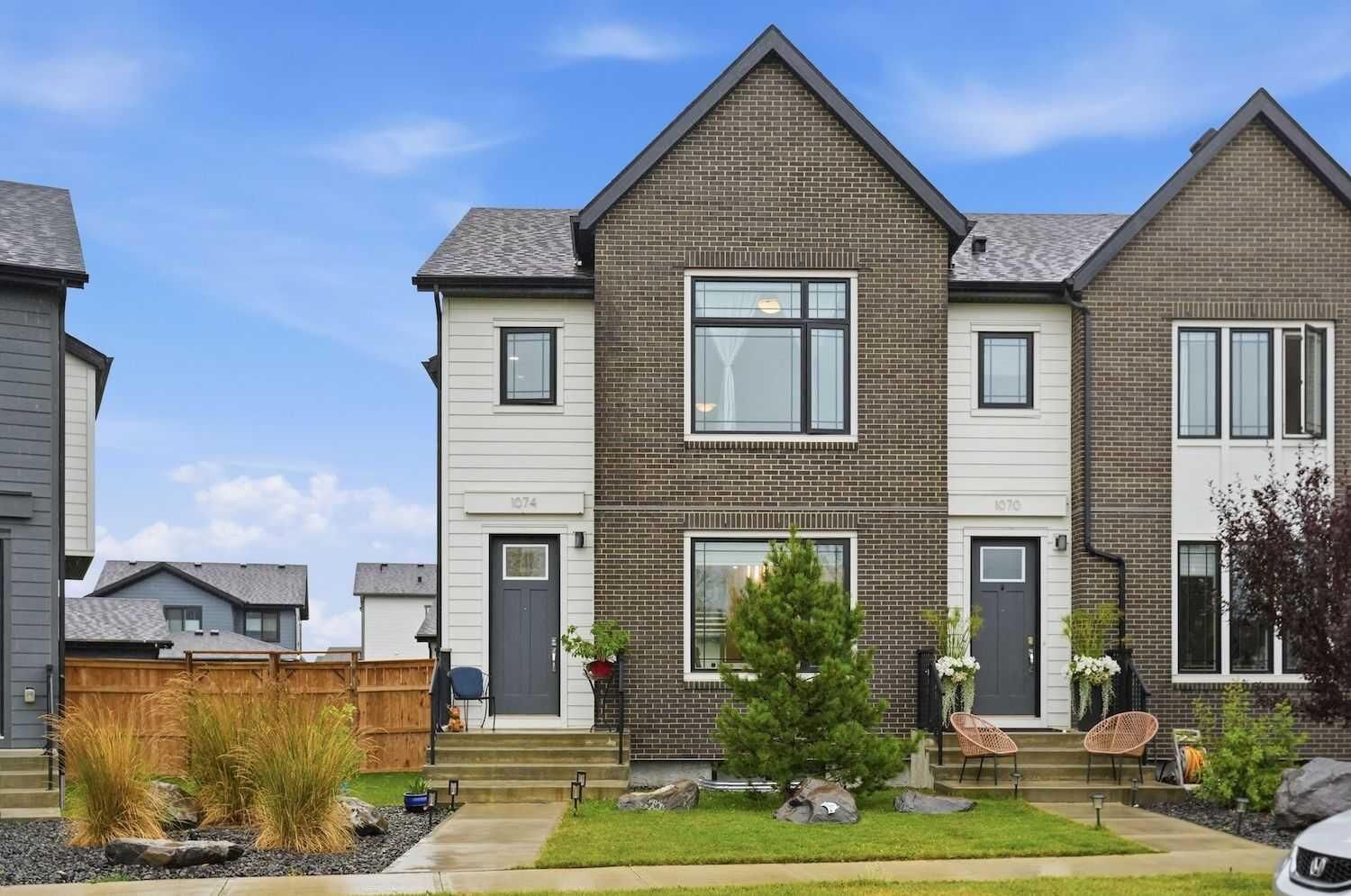 Property Photo: 1074 Harmony Parade AB T3Z 0H1