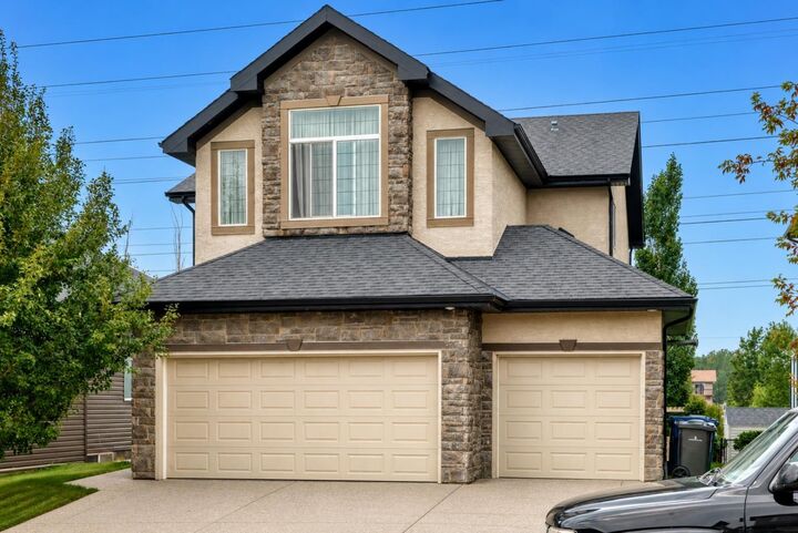 Property Photo: 212 Aspenmere Close AB T1X 0G3