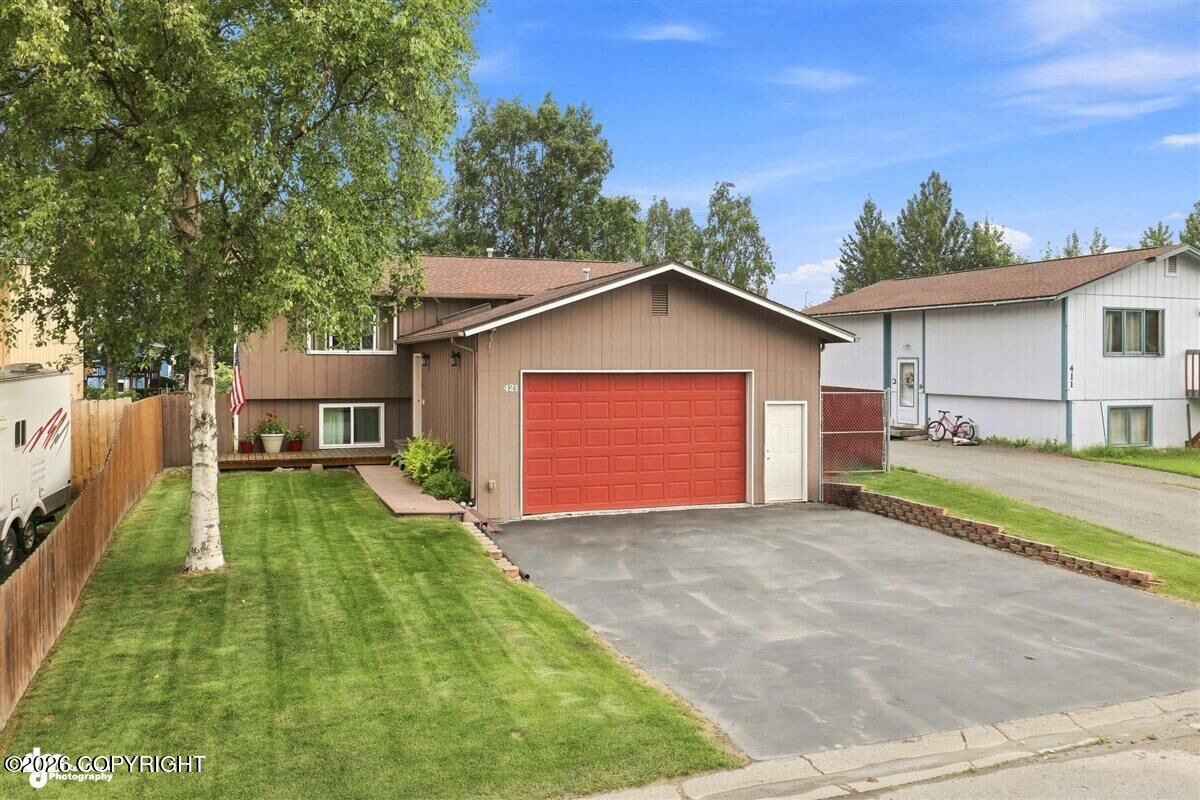 Property Photo: 421 W 91st Avenue AK 99515