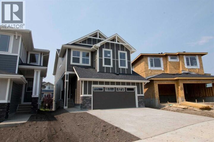 Property Photo:  127 Sundown Crescent  AB T4C 1Y3 