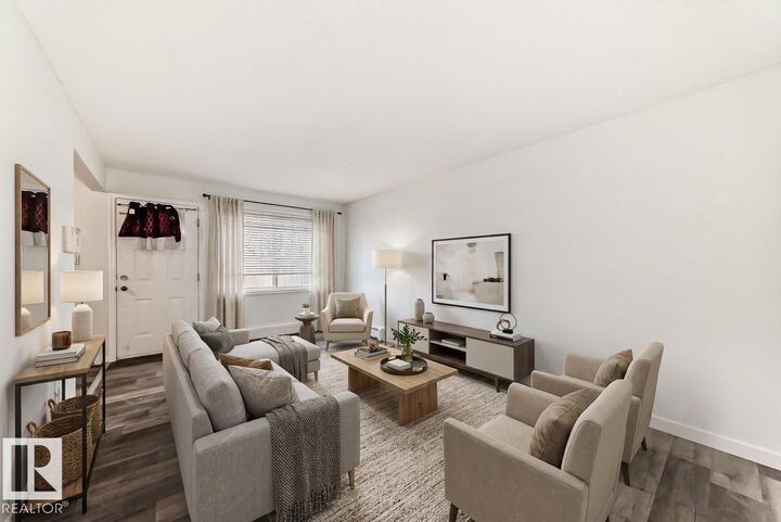 Property Photo: 18305 89 Avenue NW 18B AB T5T 1X2