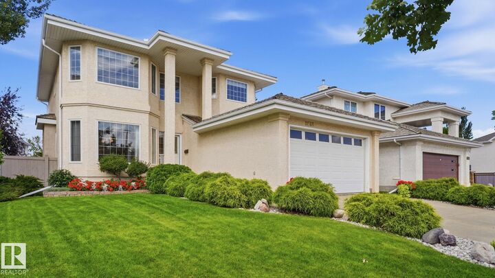 Property Photo:  11568 15 Avenue NW  AB T6J 7C9 
