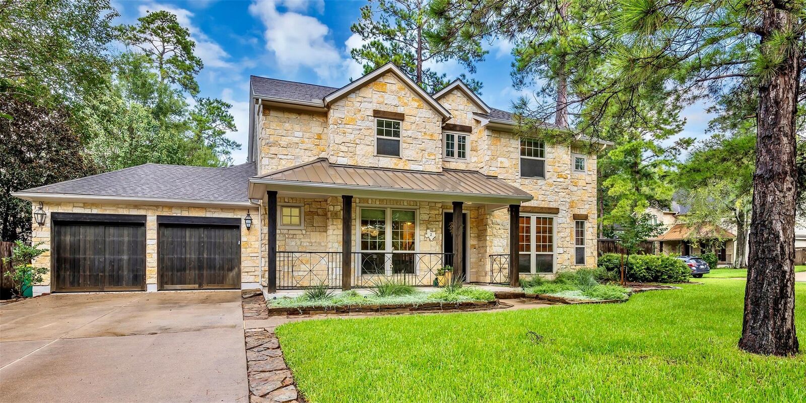 Property Photo: 2 Glistening Pond Place TX 77382
