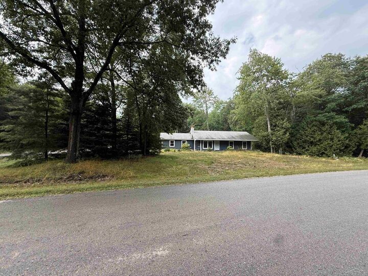 Property Photo: 4879 Kingswood Lane MI 48750
