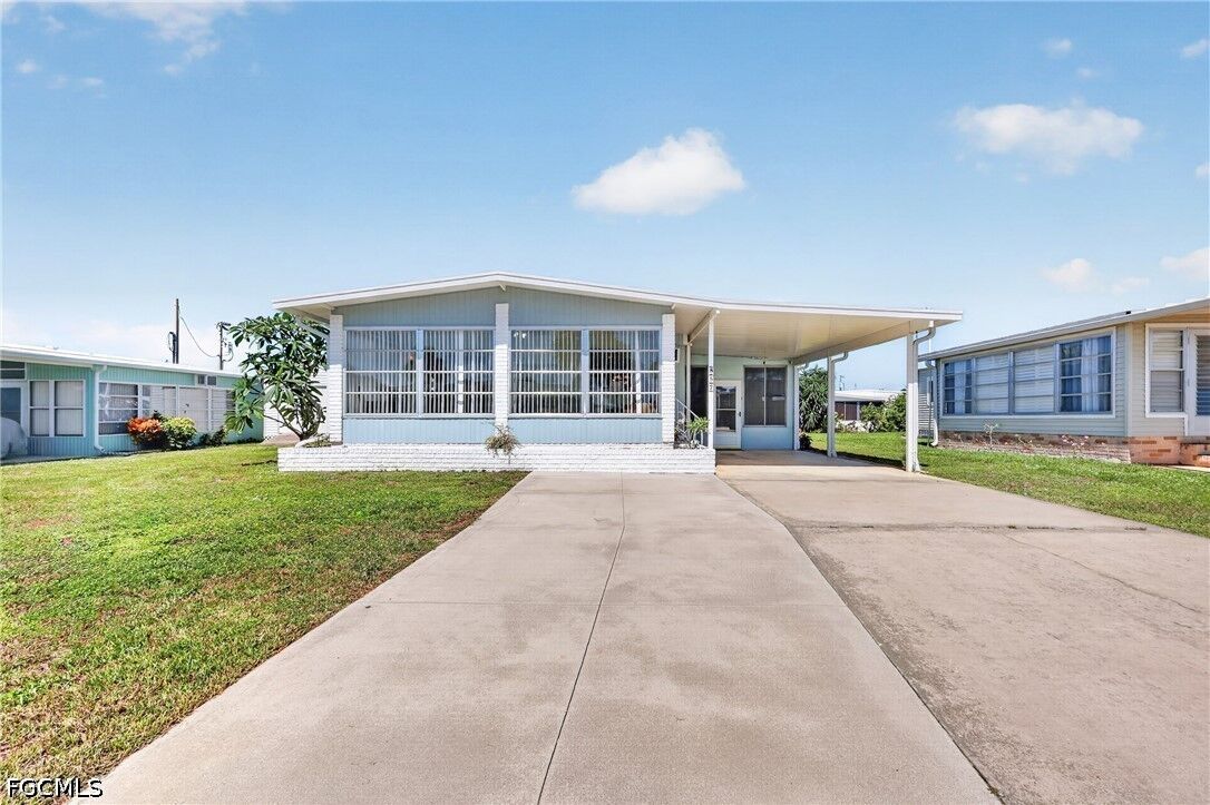 Property Photo: 557 Peace Lake Court FL 33917