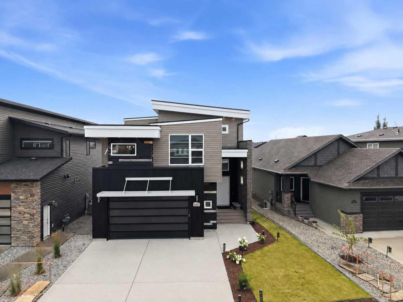 Property Photo: 102 Longmire Close AB T4R 0T1