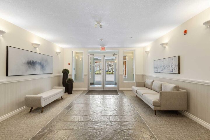Property Photo: 8 Hemlock Crescent SW 304 AB T3C 2Z1