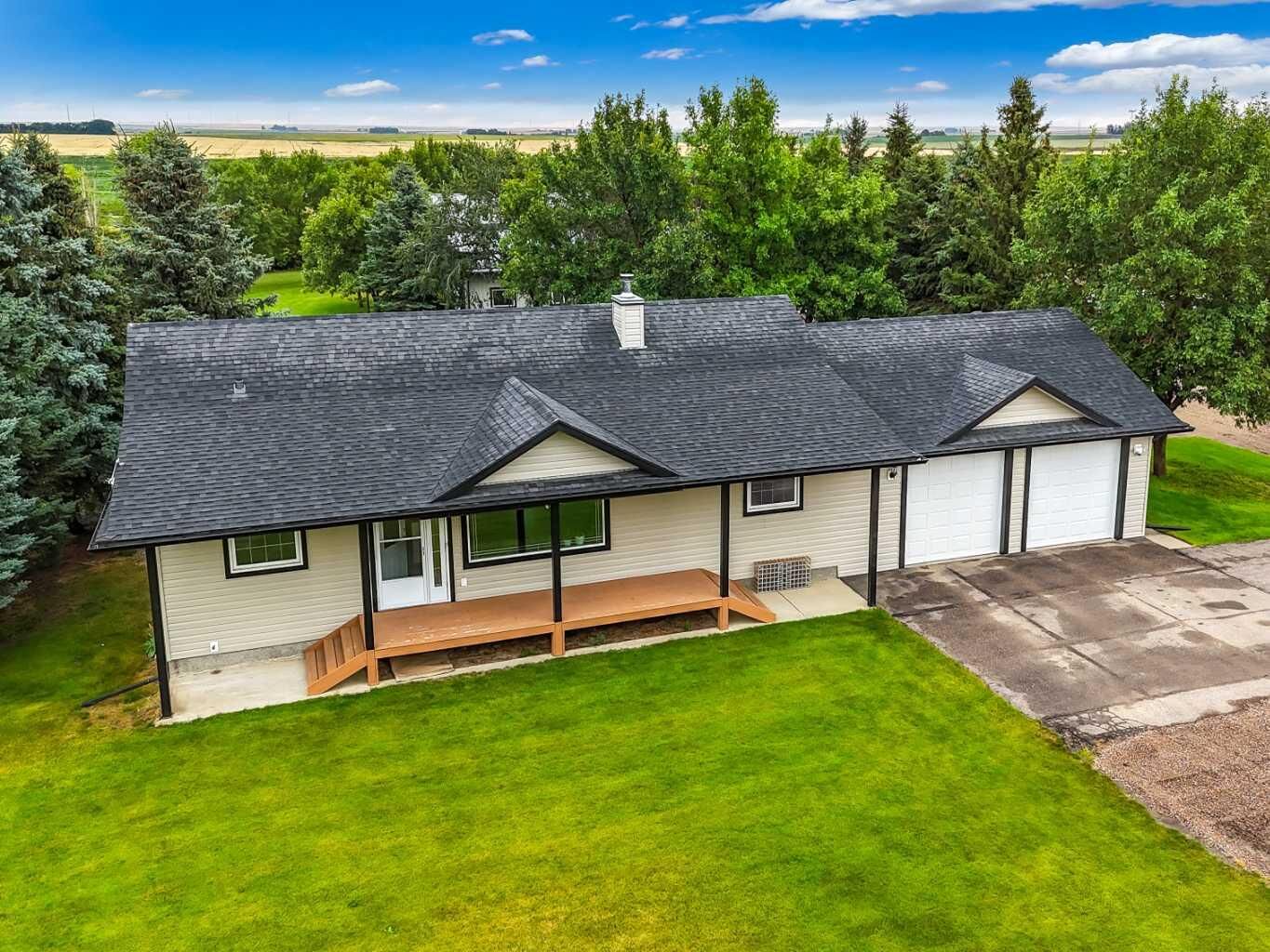 Property Photo: 104063 Range Road 111 AB T0K 0G0