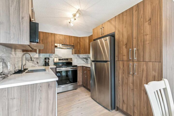 Property Photo: 116 Quigley Close AB T4C 1S4