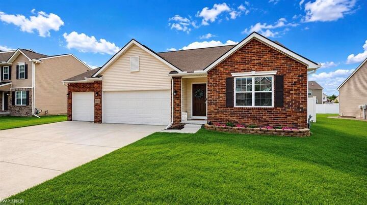 Property Photo:  58221 River Oaks Drive  MI 48048 