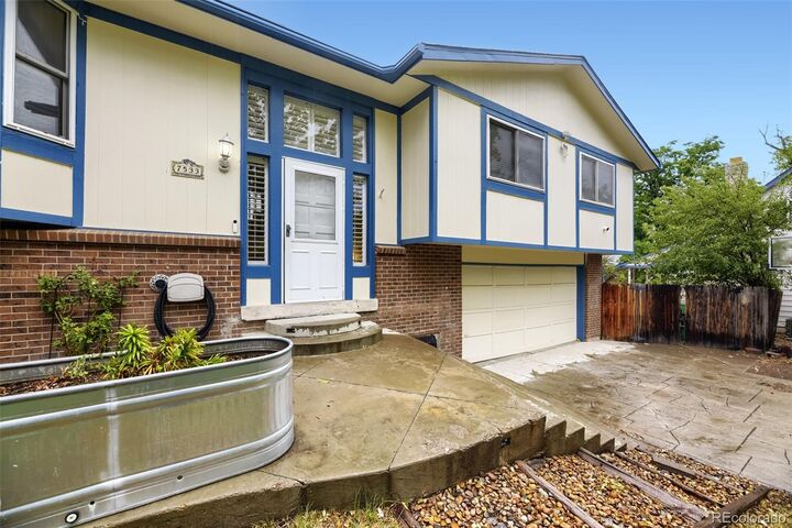 Property Photo:  7533 W Ottawa Place  CO 80128 