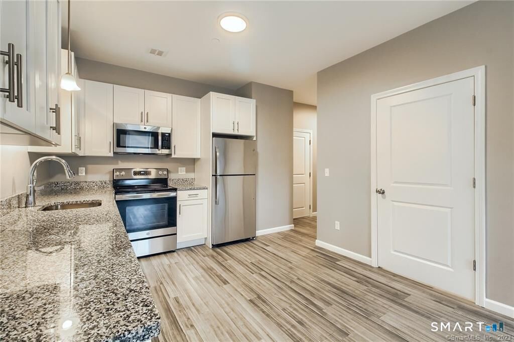 Property Photo: 9 Steele Boulevard 207 CT 06037