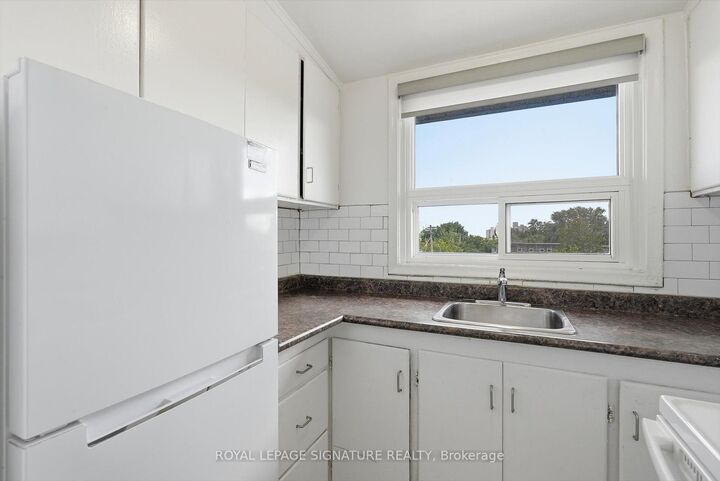Property Photo:  49 Cuffley Crescent S 301  ON M3K 1X4 