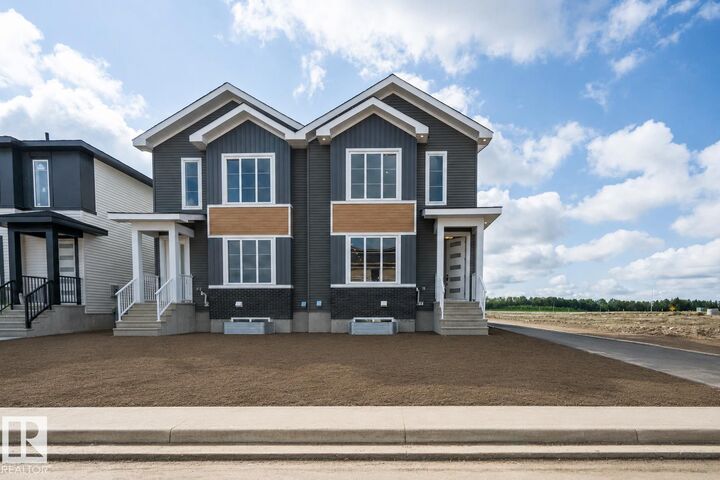 Property Photo:  432 Robinson Boulevard  AB T9E 1P8 