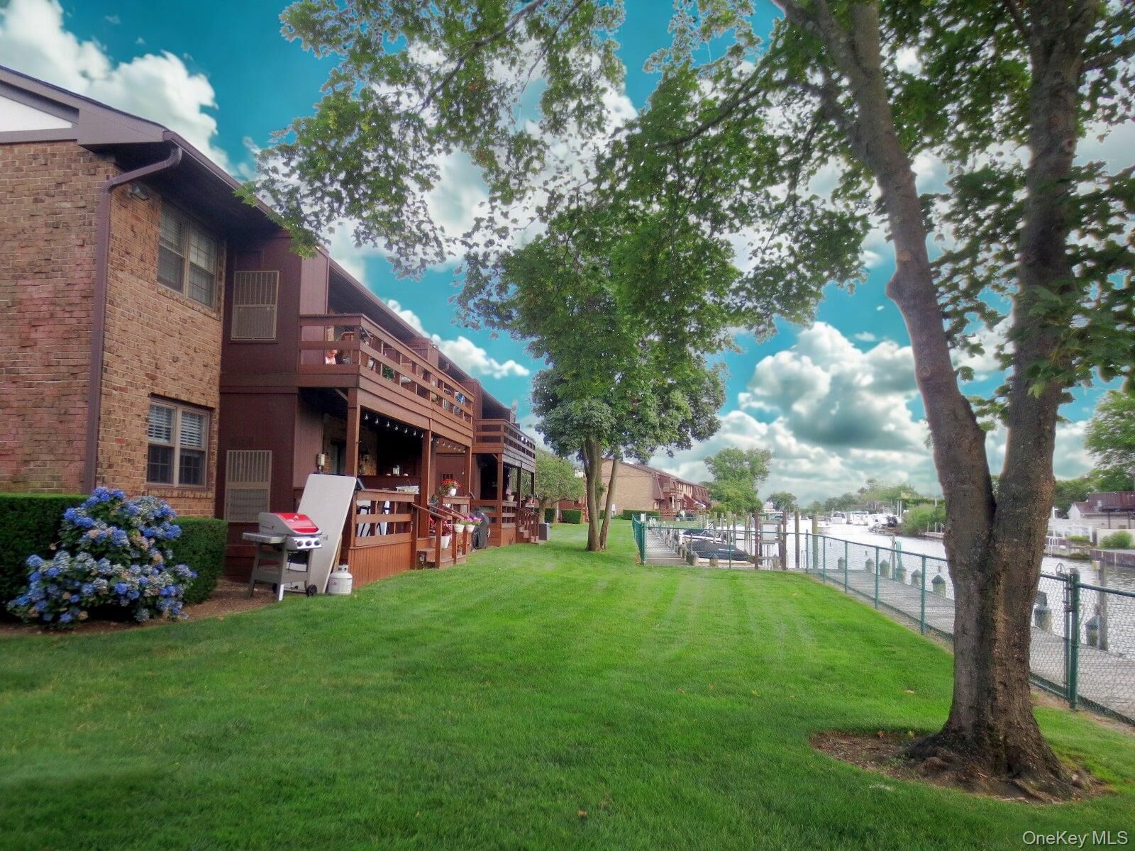 Property Photo:  106 Mariners Way  NY 11726 