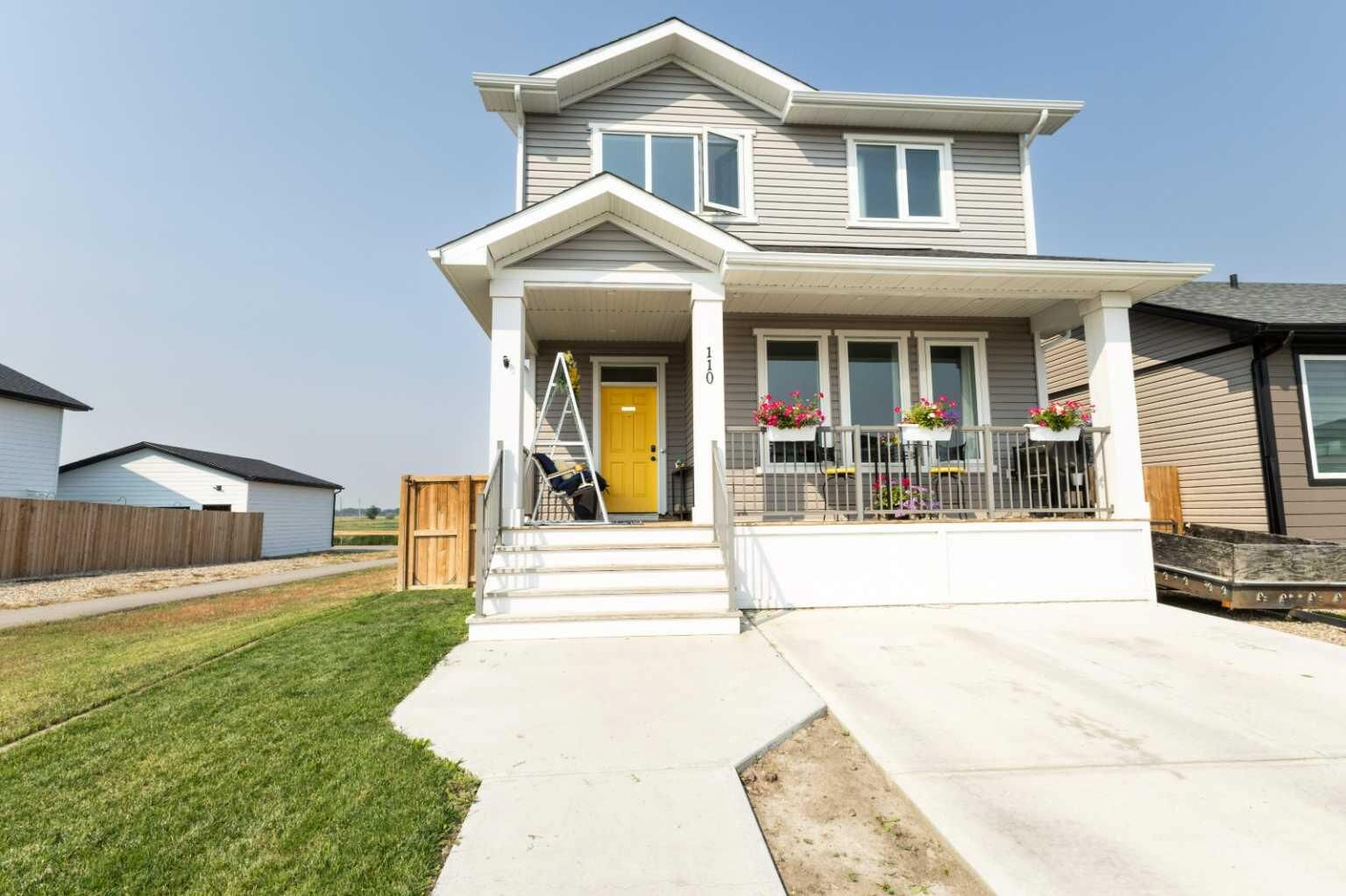 Property Photo: 110 Prairie Gold Street AB T1G 0G3