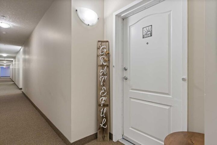 Property Photo: 43 Sunrise Loop SE 308 AB T1V 0A8
