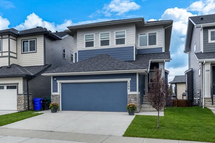 Property Photo: 124 Heritage Boulevard AB T4C 3G8