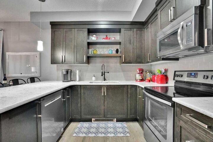 Property Photo: 6603 New Brighton Avenue SE 105 AB T2Z 5E5