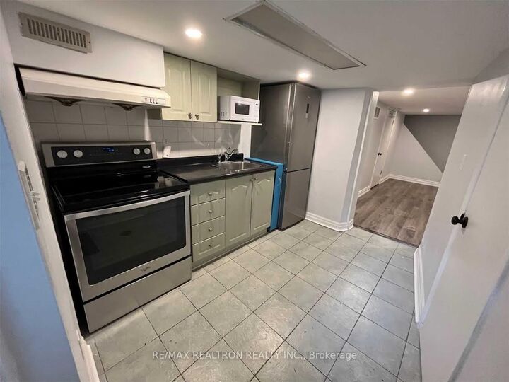 Property Photo:  372 Rhodes Avenue  ON M4L 3A5 