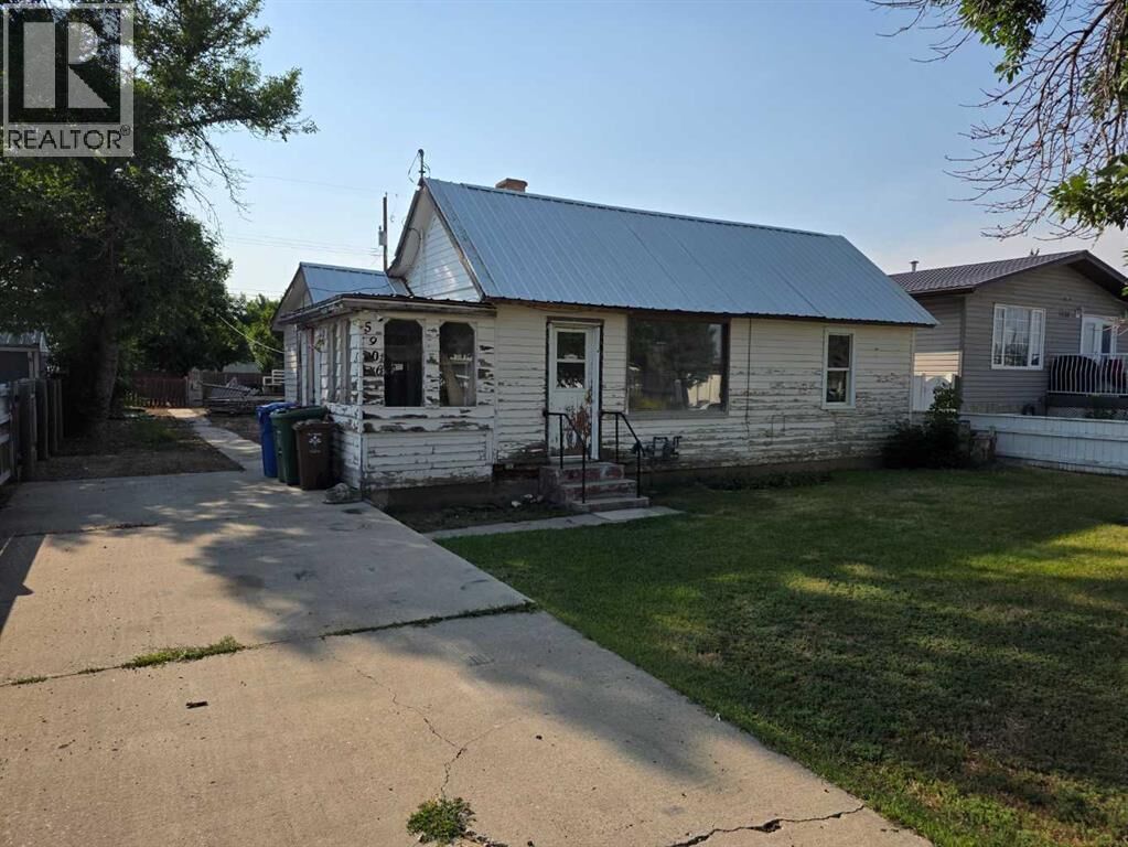 Property Photo: 5906 54 Street AB T1G 1K3