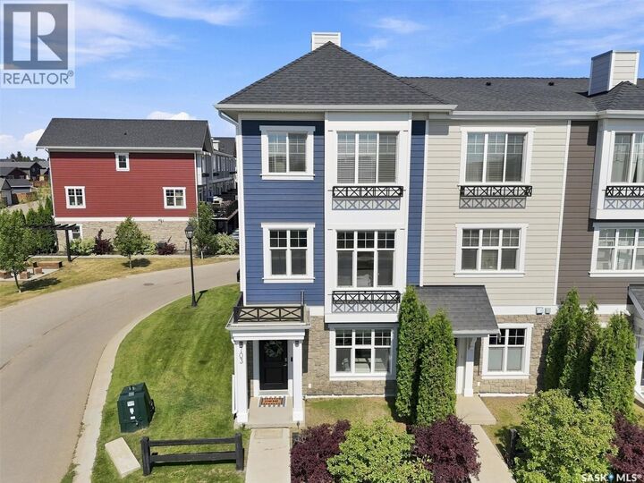 Property Photo:  703 Meadows Boulevard  SK S7V 0L3 