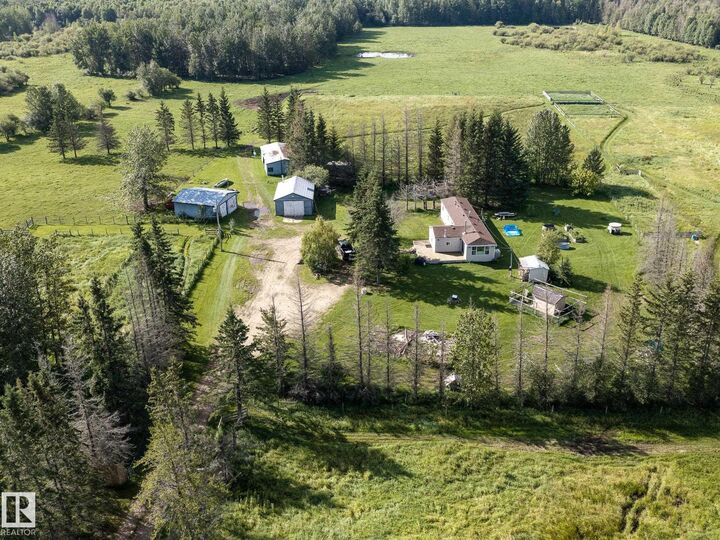 Property Photo:  214067 Hwy 55  AB T9S 1V7 
