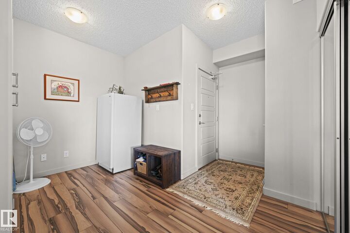 Property Photo: 320 Ambleside Link SW 301 AB T6W 2Z9