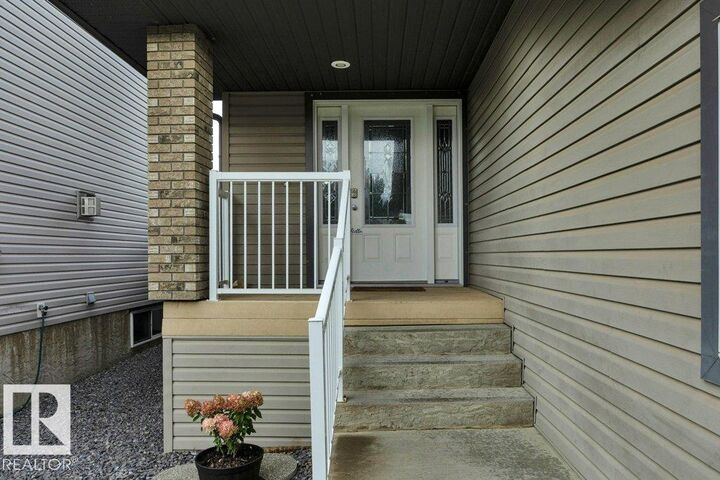 Property Photo: 27 Birchmont Drive AB T9E 8S3