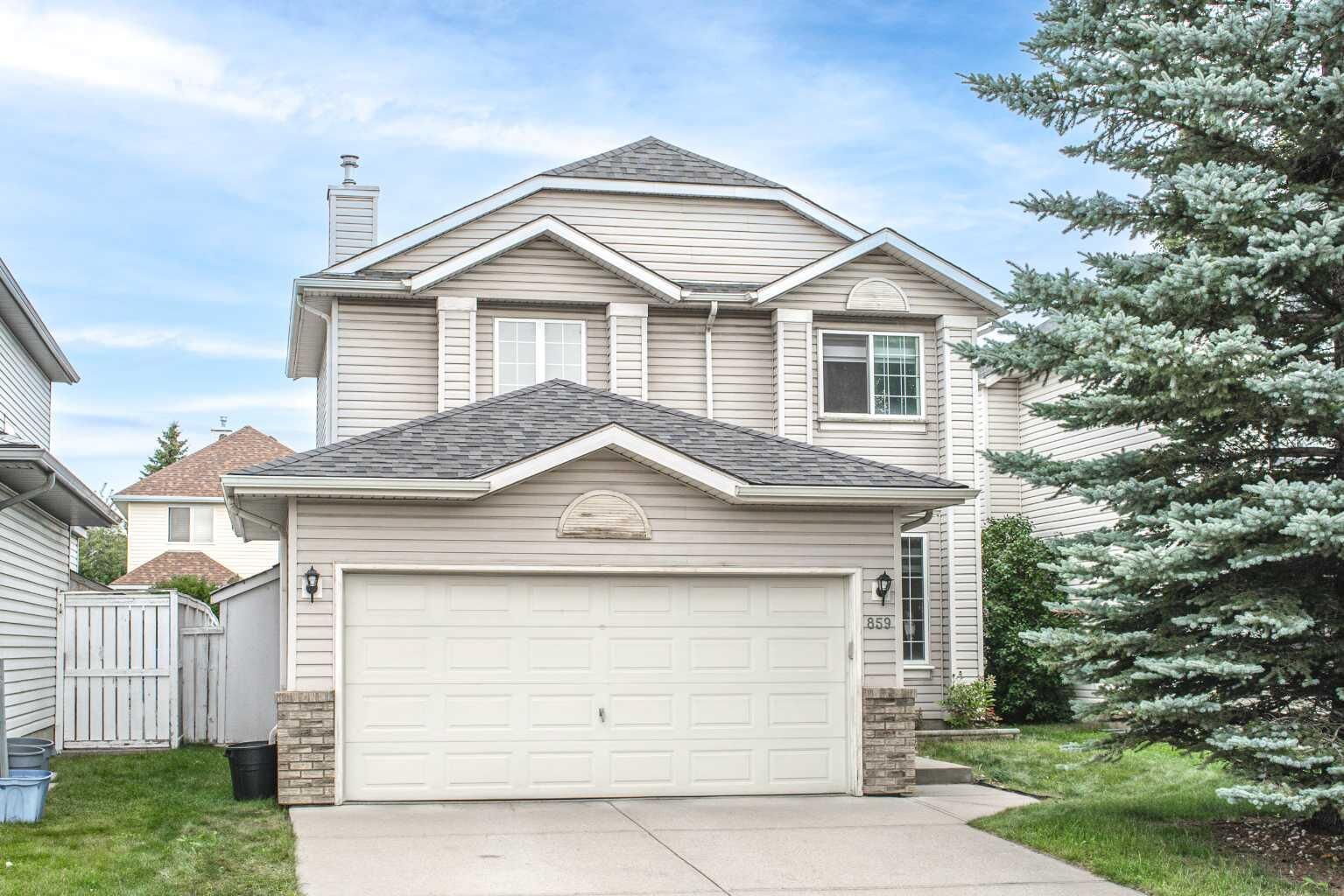 Property Photo: 859 Harvest Hills Drive NE AB T3K 4R4