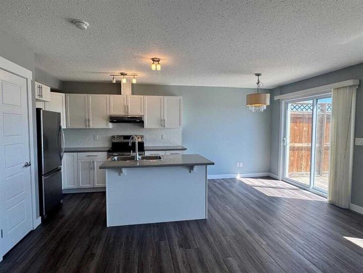 Property Photo:  8453 101 Avenue  AB T8X 0R1 