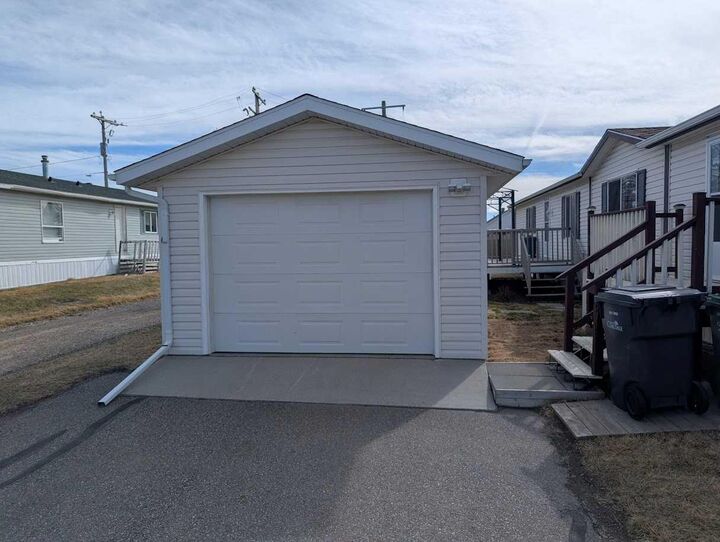 Property Photo: 211 Railway Avenue AB T1M 0A8