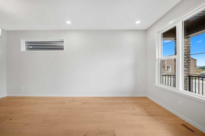 Property Photo: 109 Creekview Manor SW AB T2X 5Y1