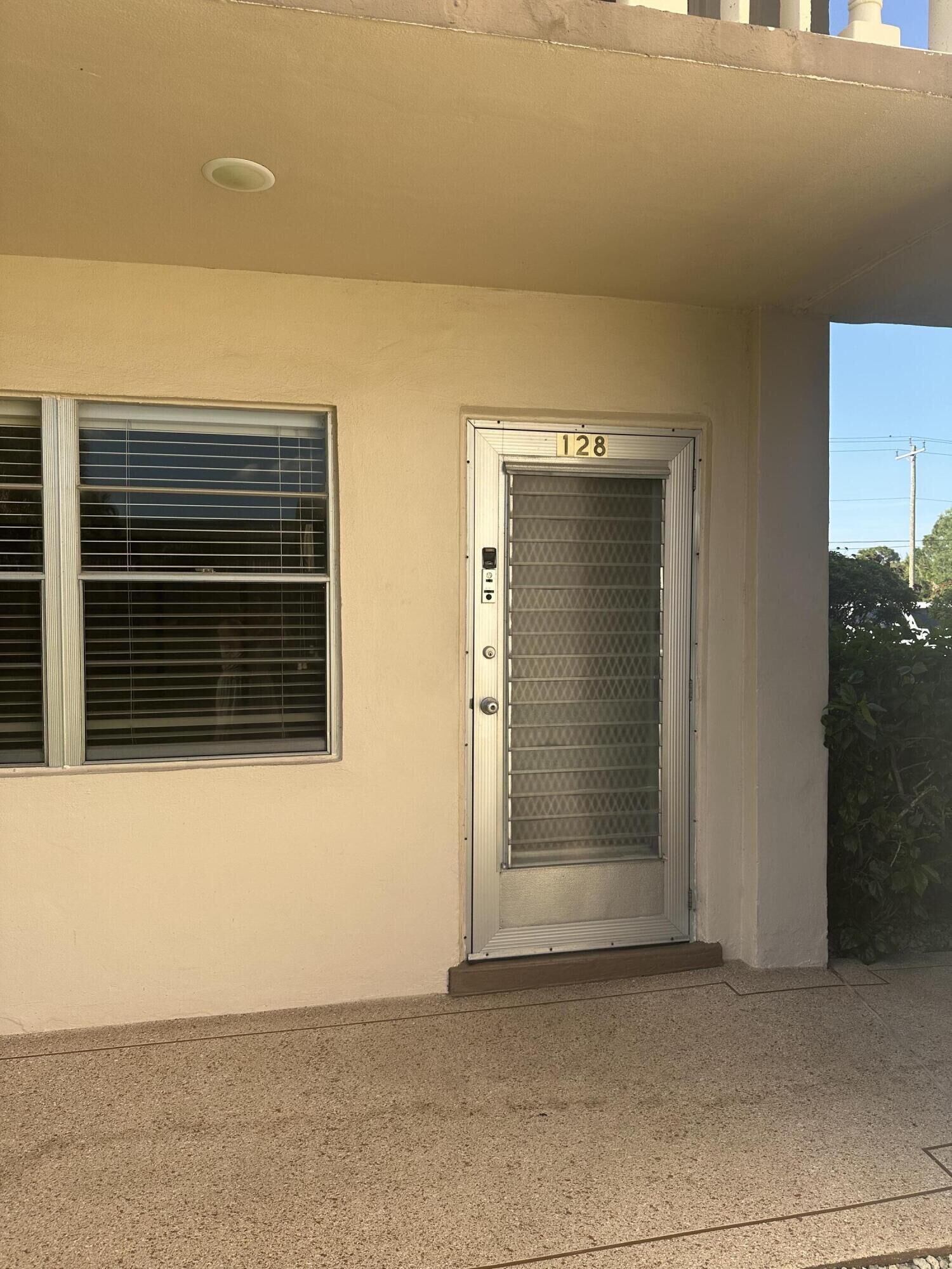 Property Photo:  128 Norwich F  FL 33417 