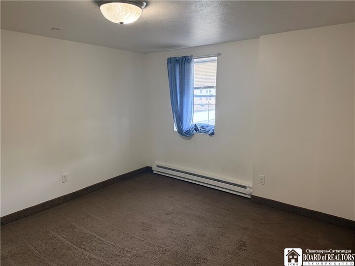 Property Photo: 21 E 3rd Street 303 NY 14701