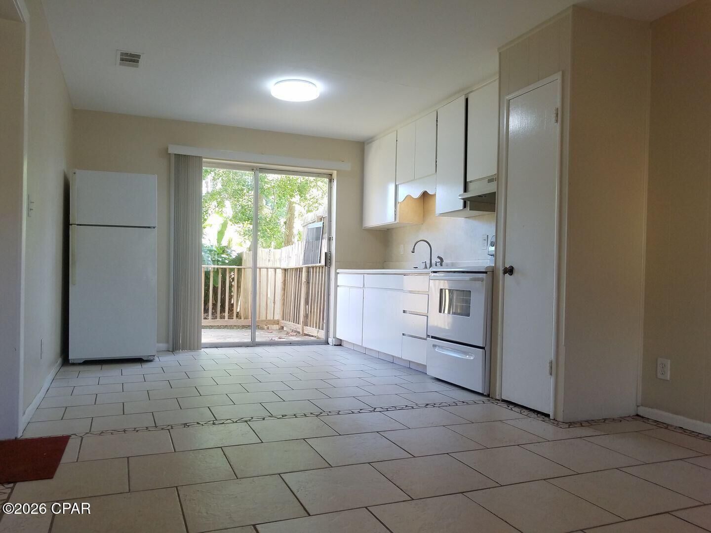 Property Photo:  7220 Poinciana Drive B  FL 32408 