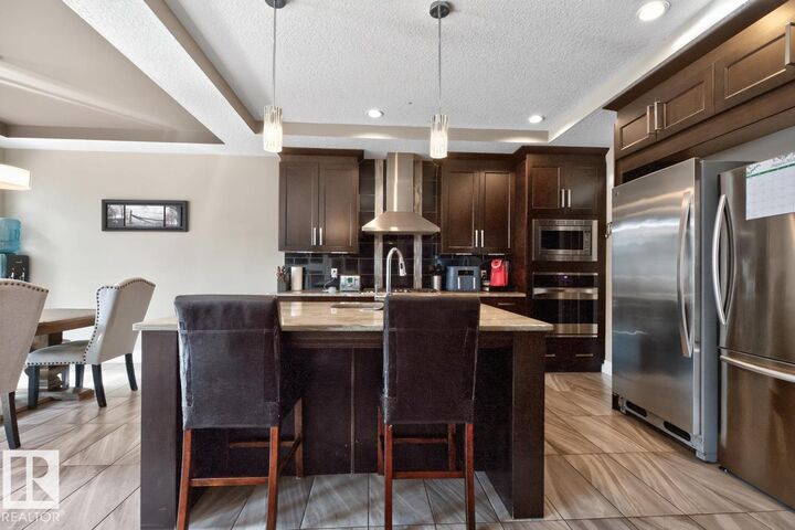 Property Photo: 77 Caragana Way AB T8L 0H4