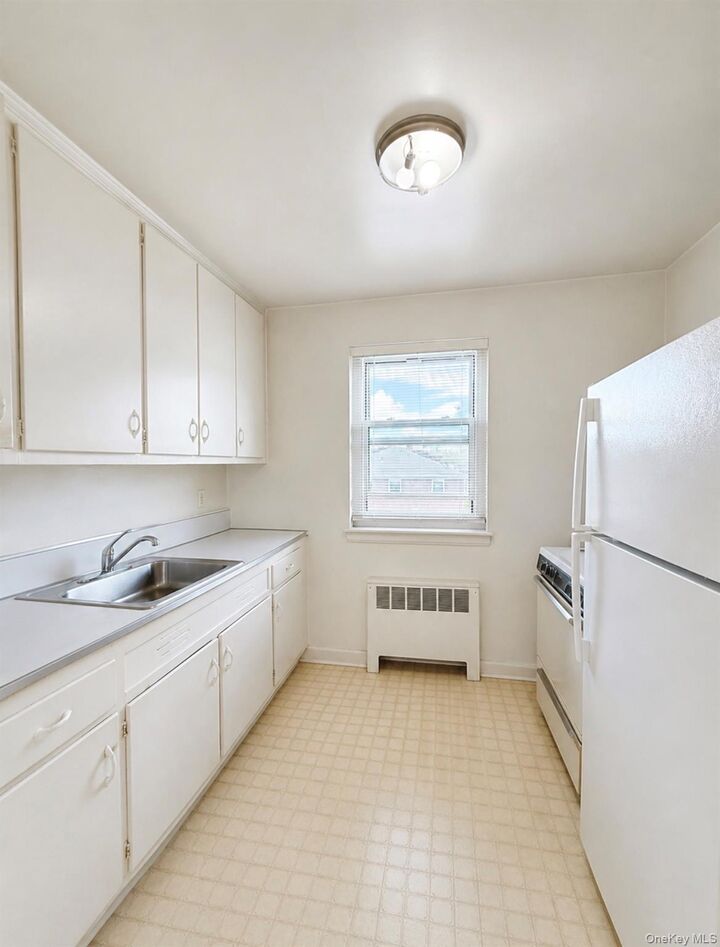 Property Photo:  6909 150 Street B  NY 11367 