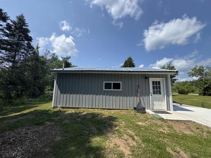 Property Photo:  978 E M-55  MI 48661 