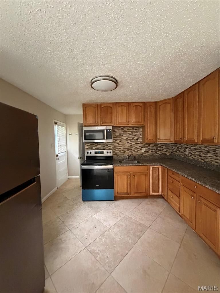Property Photo: 8908 Saint Louis Avenue MO 63114