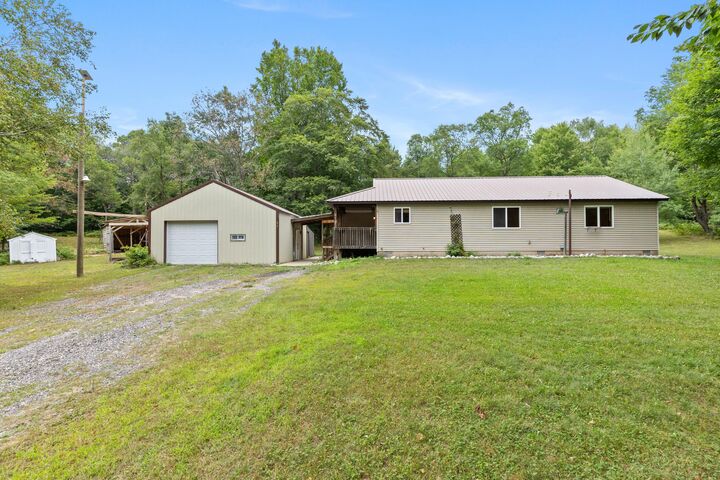 Property Photo:  11642 S Woodland Drive  MI 49601 