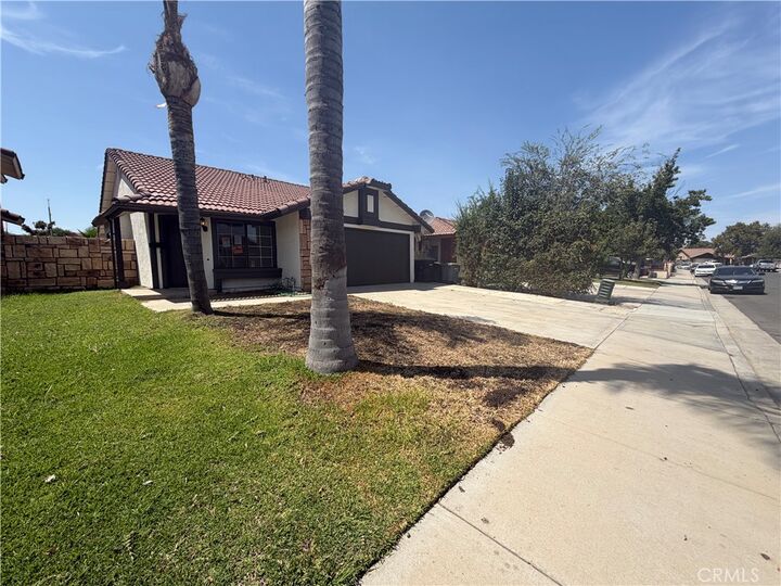 Property Photo: 1910 Summertree Drive CA 92571