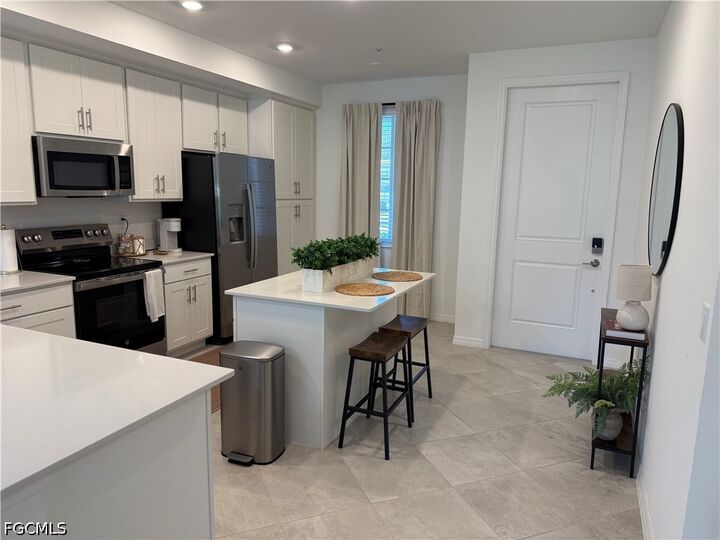 Property Photo: 18421 Copperhead Court N 215 FL 33936