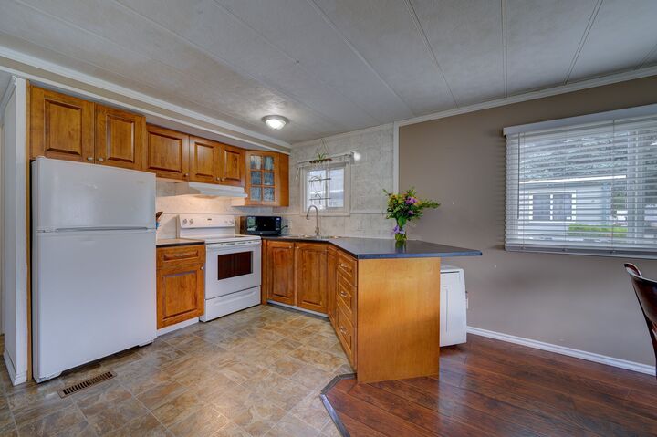 Property Photo: 2400 Oakdale Way 112 BC V2B 6W7