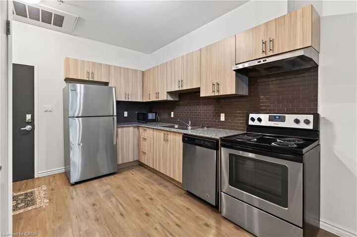 Property Photo:  275 Larch Street F-114  ON N2L 0J3 