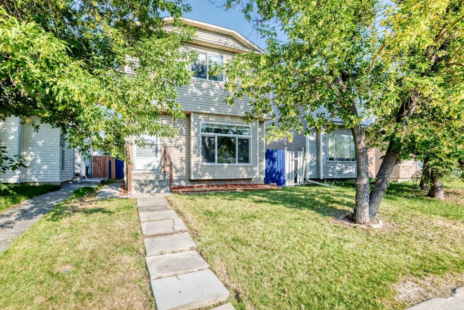 Property Photo: 77 Martinbrook Road NE AB T3J 3E1