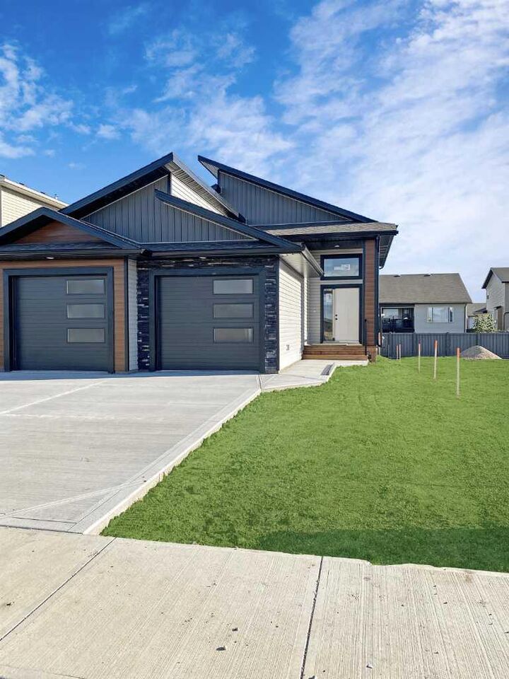 Property Photo:  10410 128 Avenue  AB T8V 6J5 