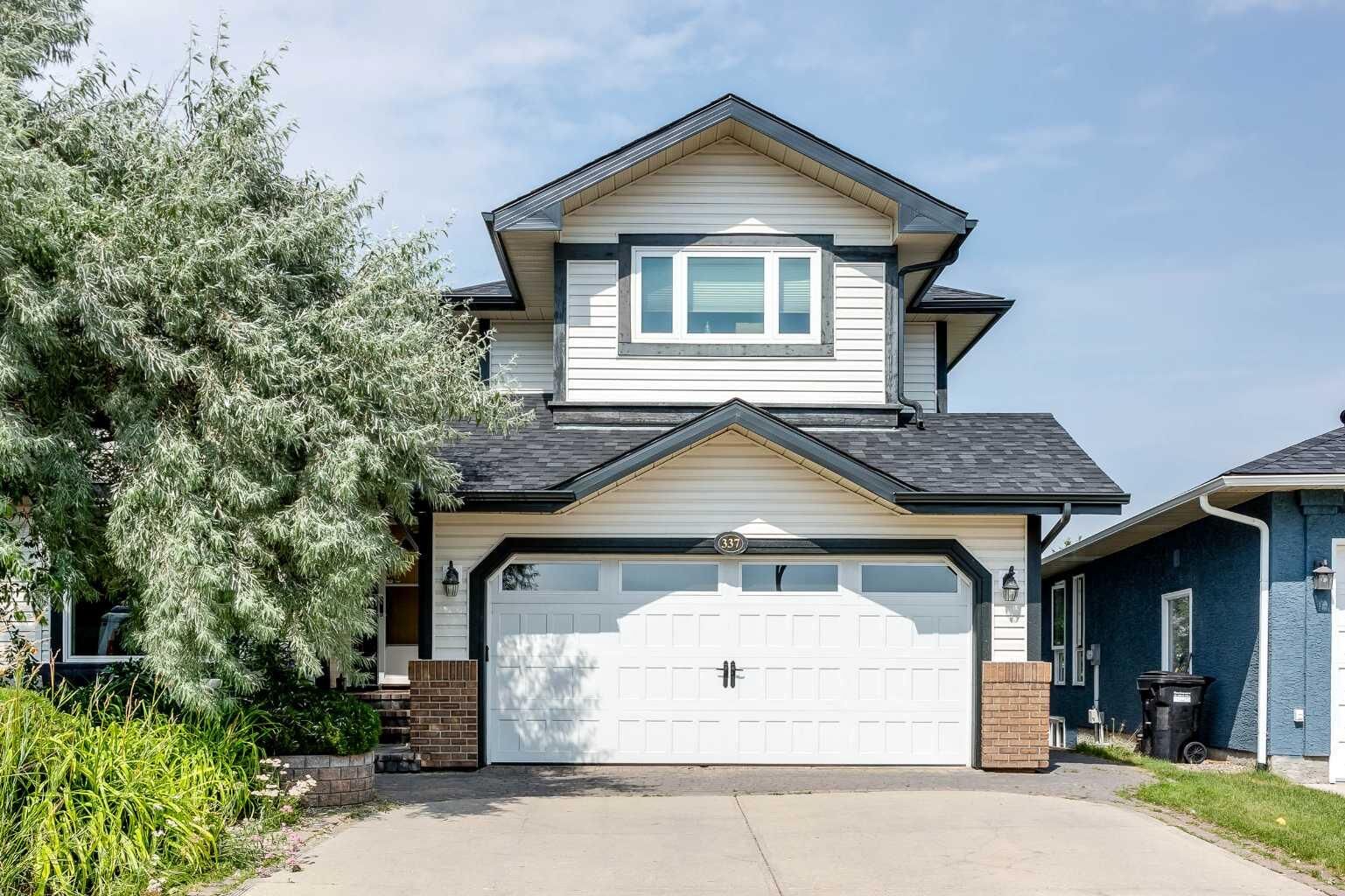 Property Photo: 337 Sandringham Court NW AB T3K 3V6